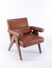 Accent chair, KD rubber wood legs with Walnut finish. PU leather cover the seat. With a cushion.Brown